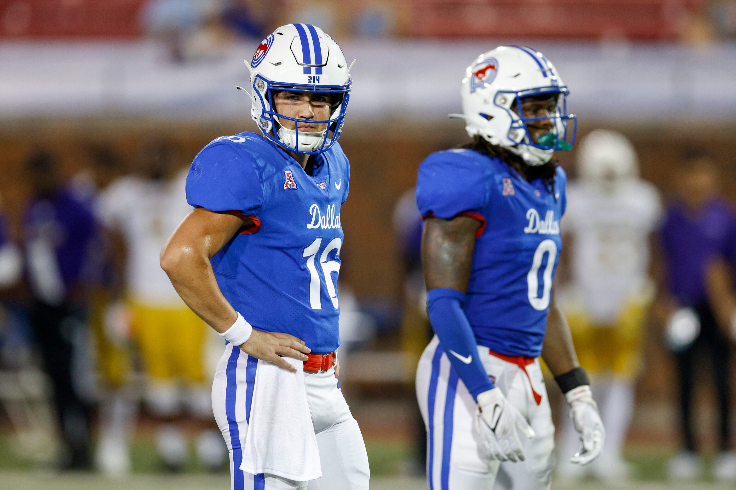 SMU quarterback Alex Padilla (16) looks to the sideline before the snap alongside SMU...