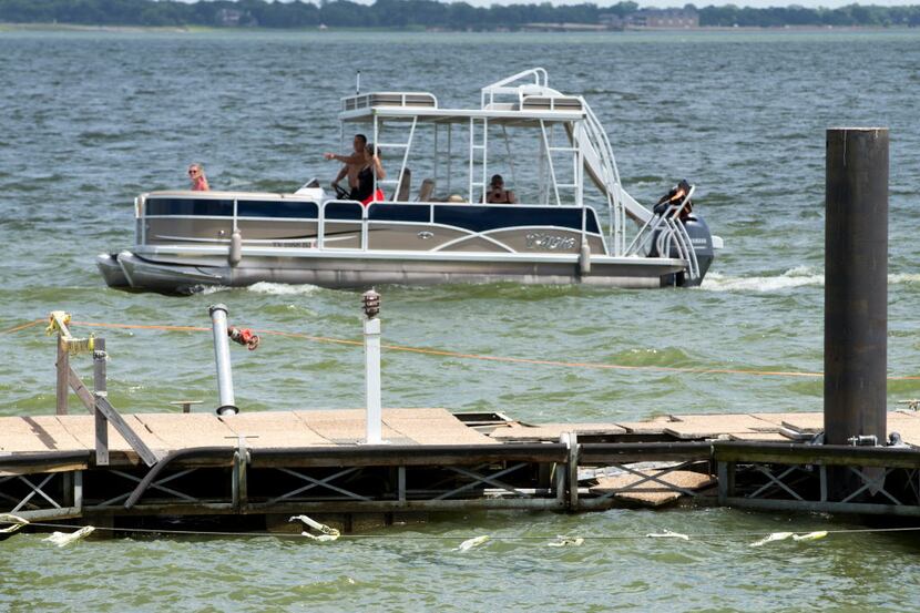  Damages on the closed off Harbor Point boat dock on June 25, 2016 in Garland. (Ting...