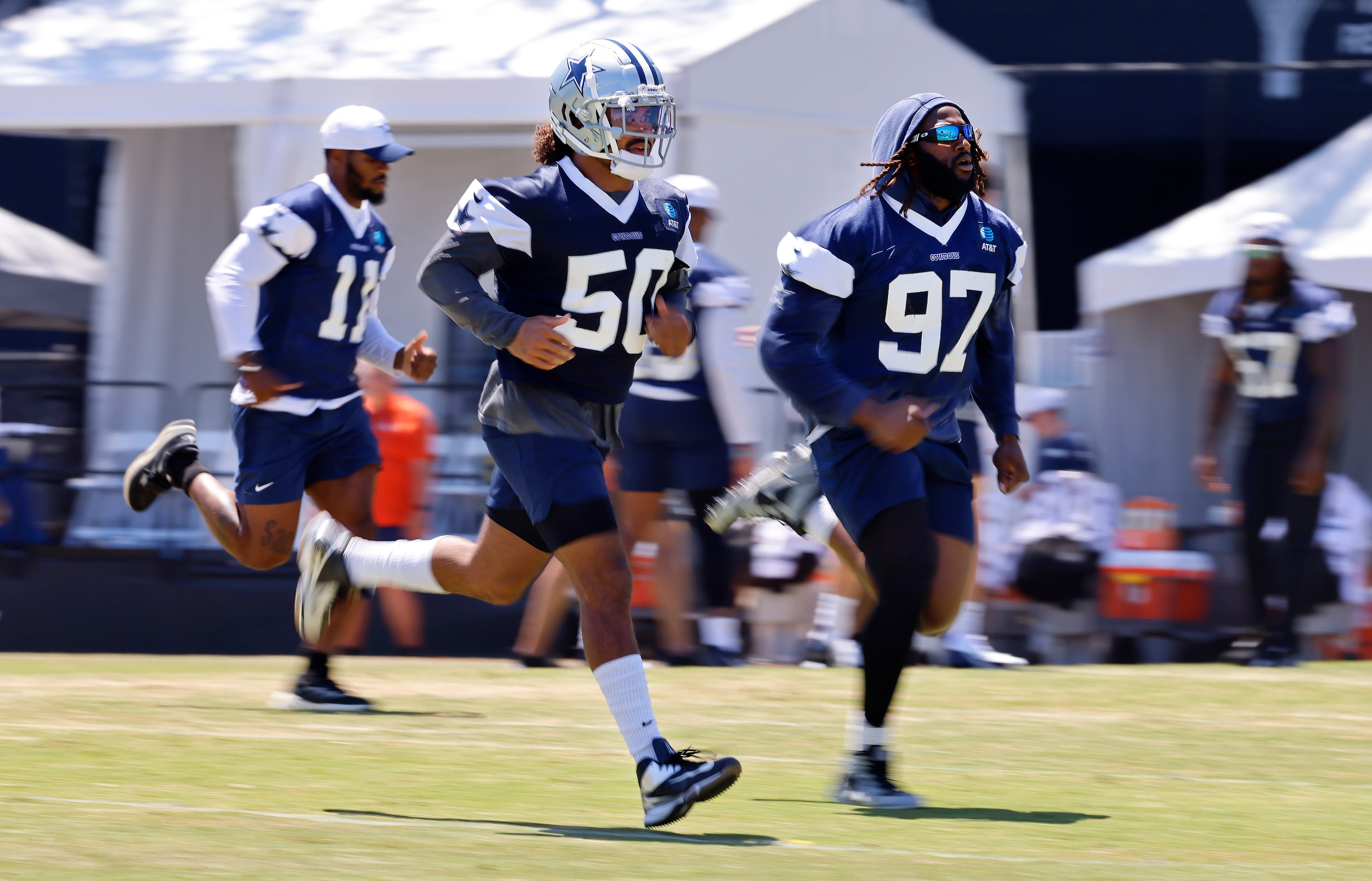 Dallas Cowboys linebacker Eric Kendricks (50), defensive tackle Osa Odighizuwa (97) and...