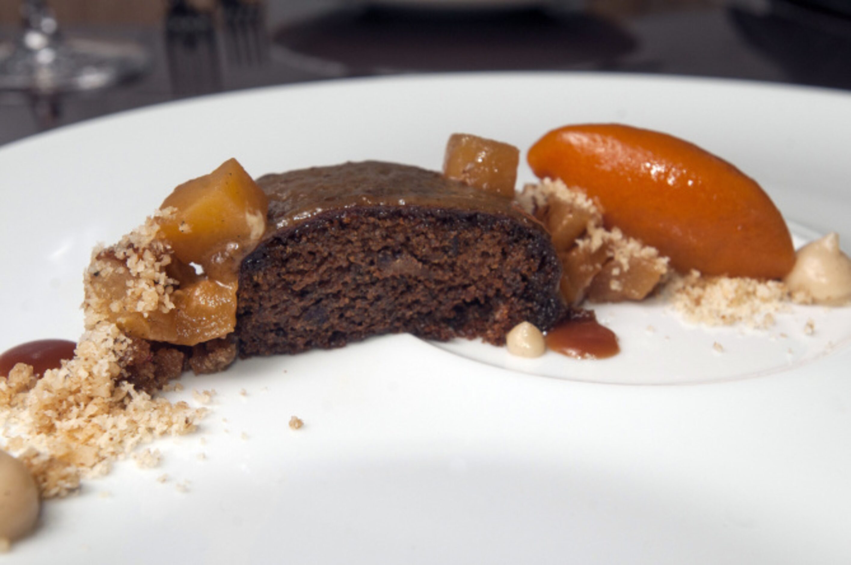 A wedge of sticky toffee pudding with pumpkin, pineapple and walnut at FT33