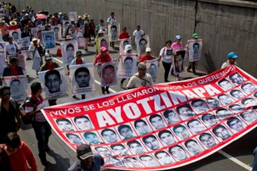  Pleading for justice in the case of the missing 43 students in Mexico. (AP Photo/Rebecca...