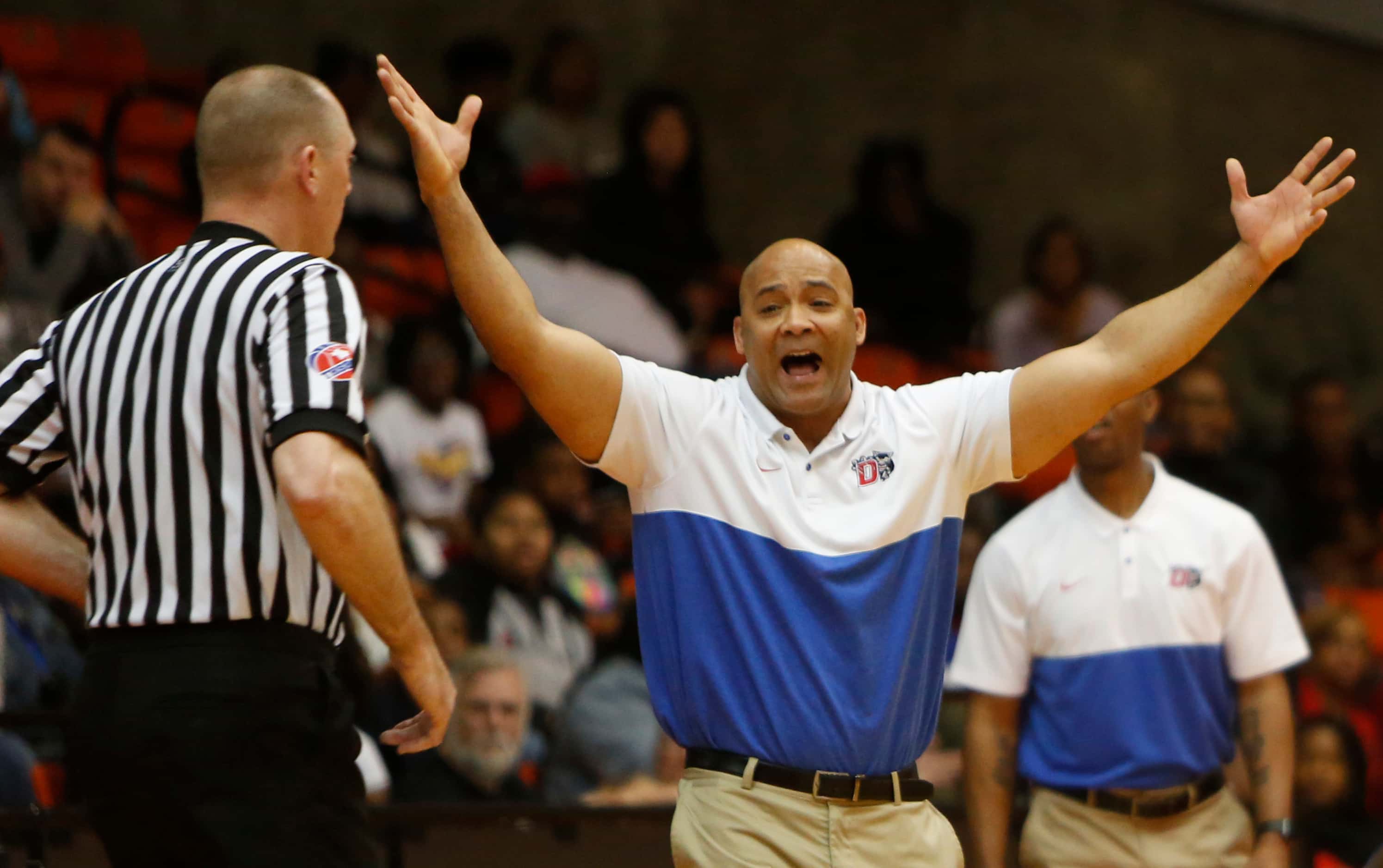Duncanville head coach David Peavy question the lack of a call during first half action of...