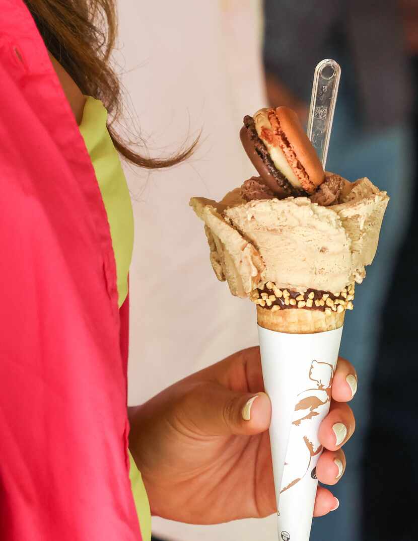 Alizsa Raquel holds a cone of gelato from Amorino at Legacy West in Plano on Thursday, June...