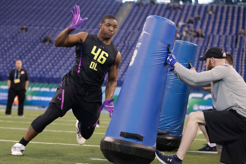 Mississippi defensive lineman Breeland Speaks runs a drill at the NFL football scouting...