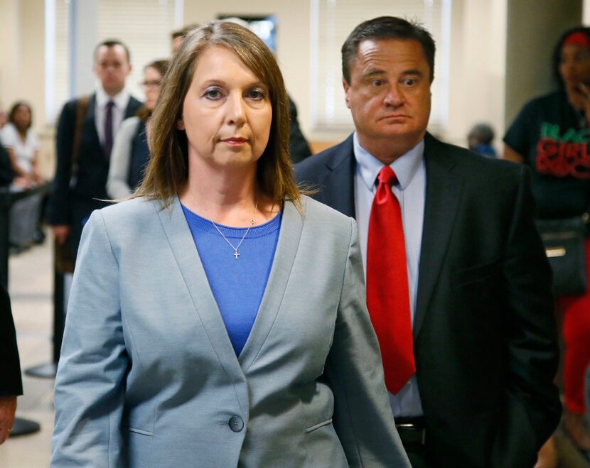 Betty Jo Shelby leaves the courtroom after the jury in her case began deliberations in Tulsa...