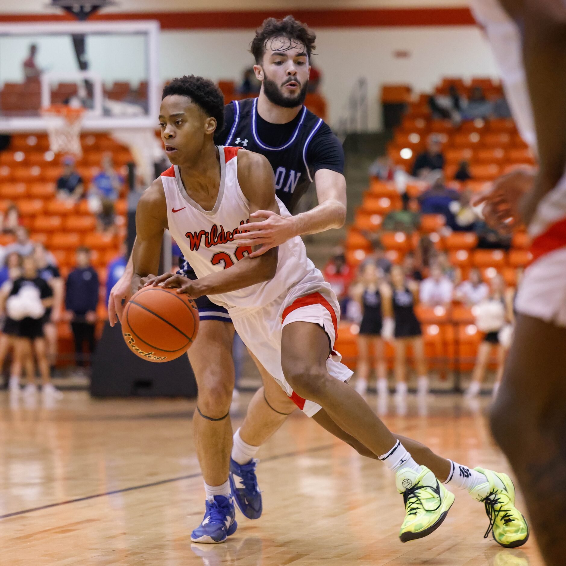 Lake Highlands High School' Tre Johnson (20) protects the ball against Byron Nelson High...