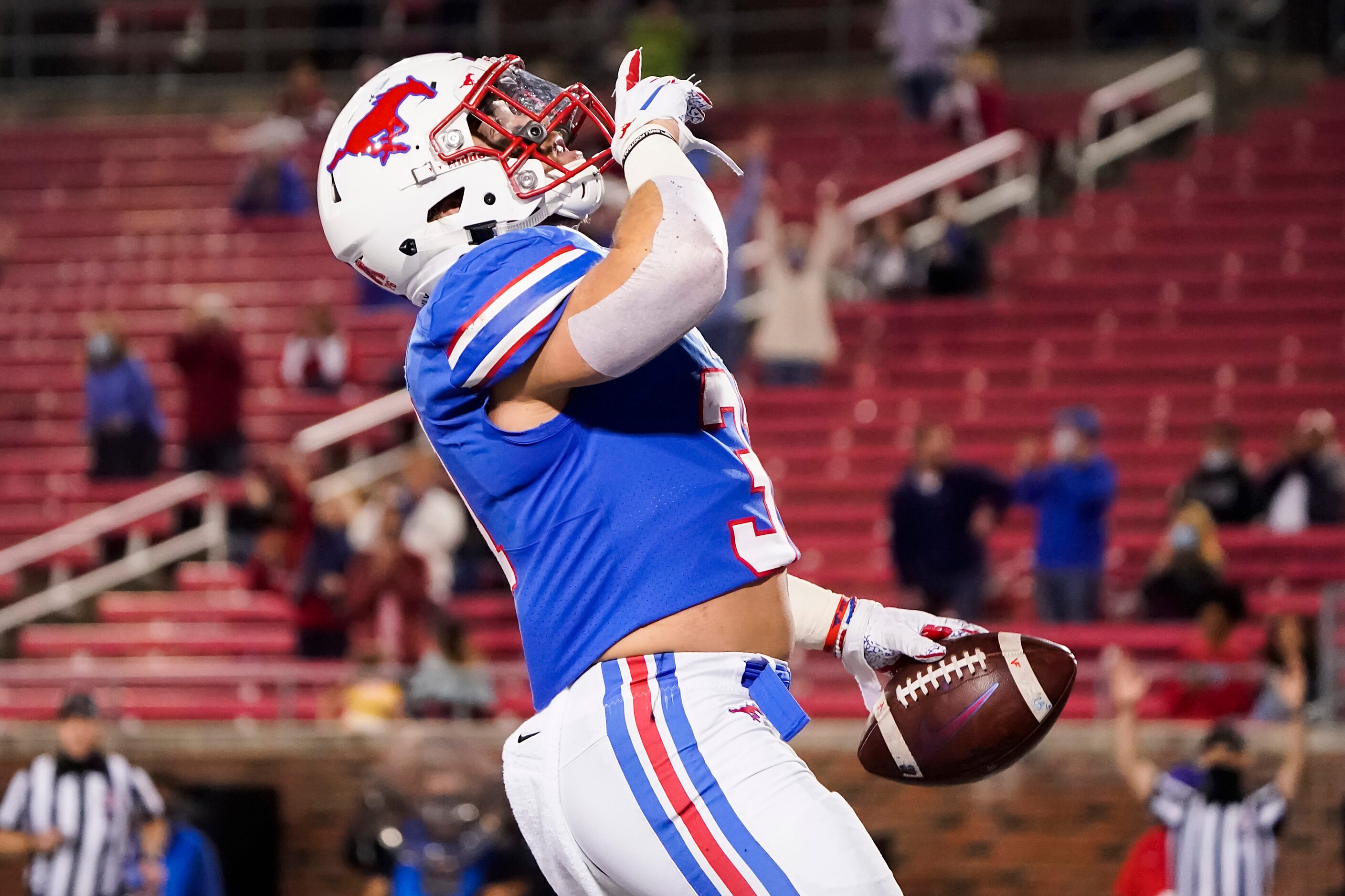 SMU running back Tyler Lavine celebrates after scoring on a touchdown run during the second...