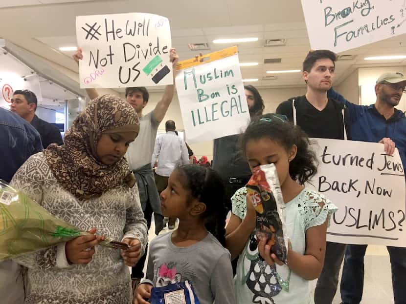 Family members whose grandmother from Sudan is being held at Dallas-Fort Worth International...