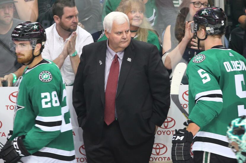 Dallas Stars head coach Ken Hitchcock is pictured on the bench near the end of the first...