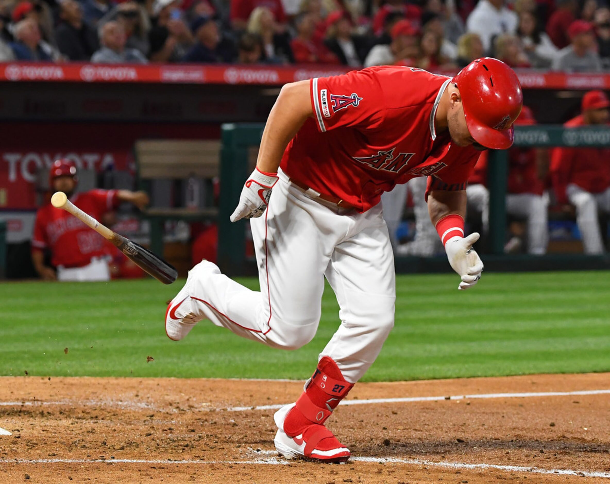 ANAHEIM, CA - MAY 25: Mike Trout #27 of the Los Angeles Angels of Anaheim drops his bat as...