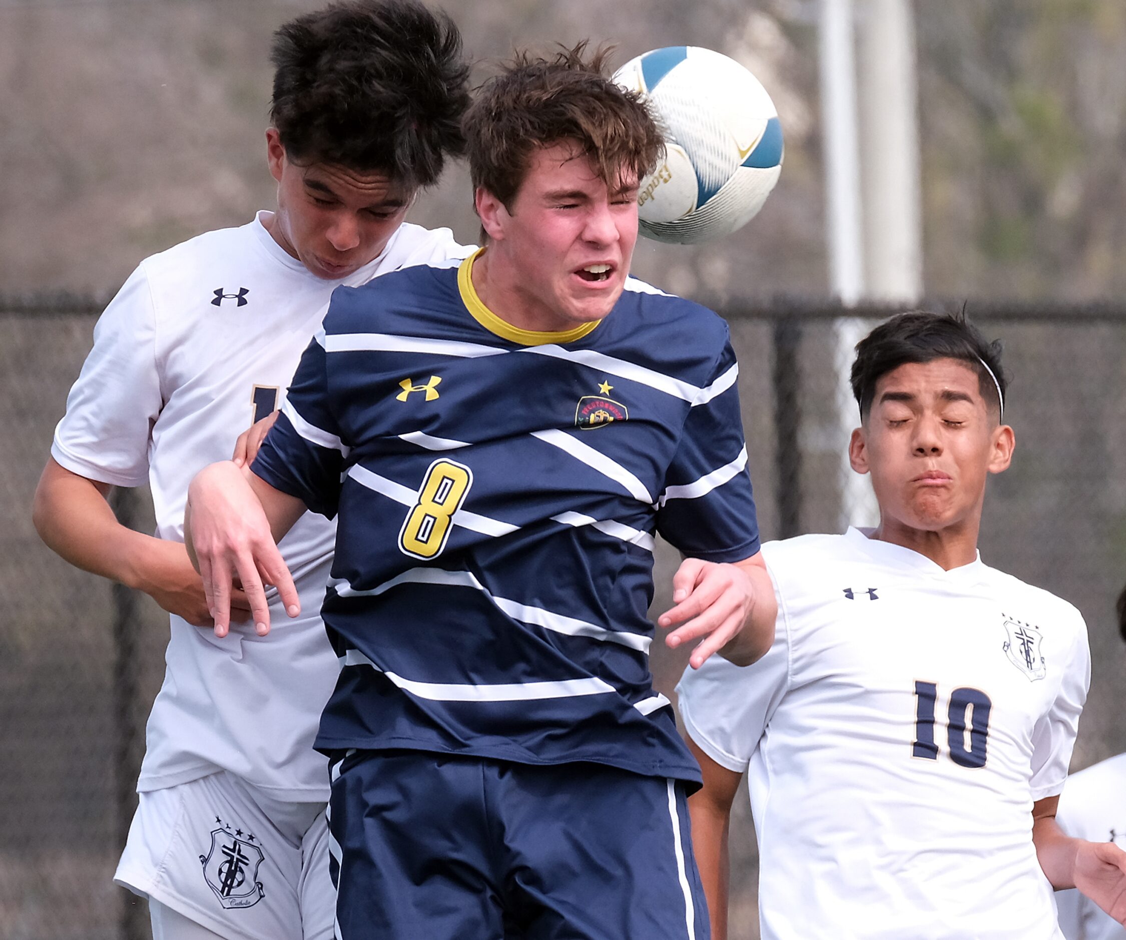 #8 Benjamin Baldwin of Prestonwood Christian takes the header away from Central Catholic in...