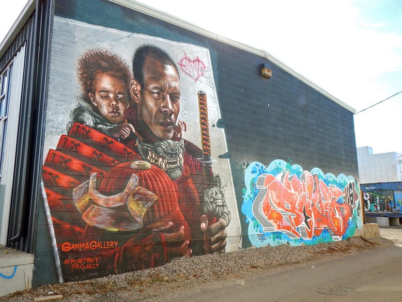 A soul-searching portrait of a man and child is just one example of the urban street art  on...