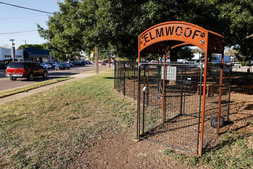 The Elmwoof dog park sits between businesses housed in 85-year-old buildings and Margaret B...