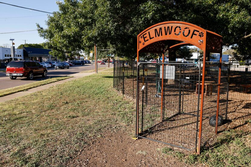 The Elmwoof dog park sits between businesses housed in 85-year-old buildings and Margaret B...