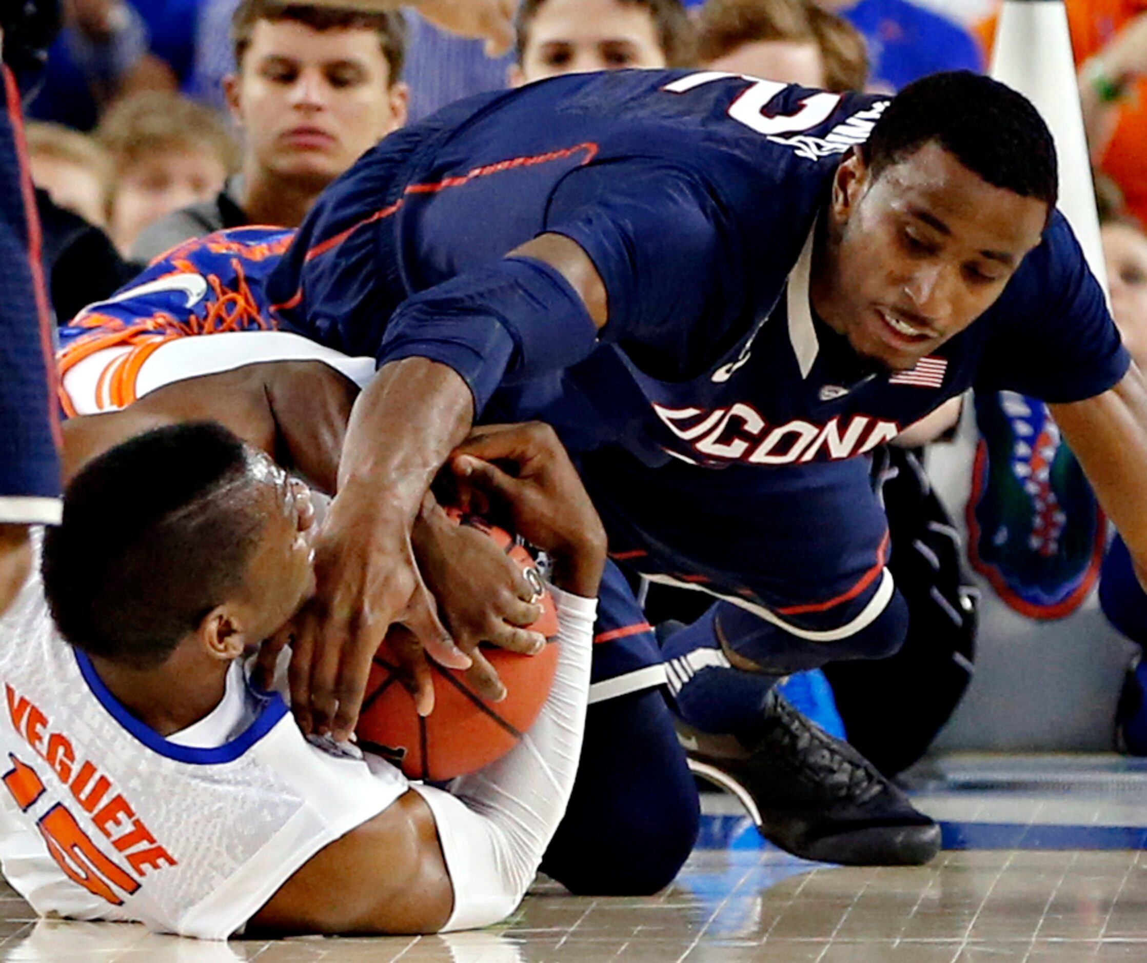 Connecticut Huskies forward DeAndre Daniels (2) and Florida Gators forward Will Yeguete...