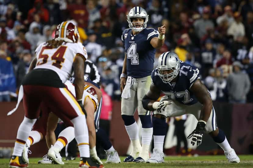 Dallas Cowboys quarterback Dak Prescott (4) calls out a play in the fourth quarter at...