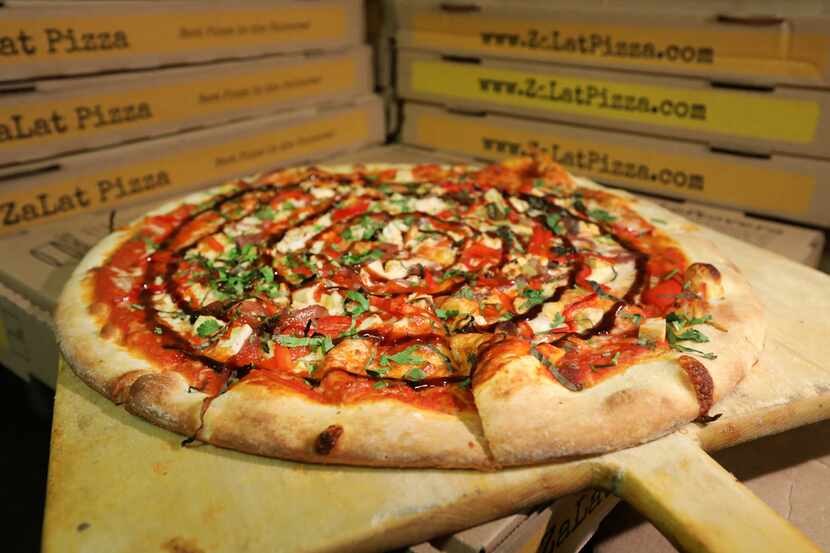 Zalat owner Khanh Nguyen also owns DaLat, a Vietnamese restaurant. Zalat's Pho Shizzle pizza...