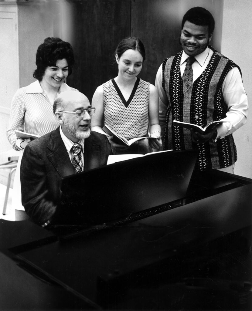 In this file photo, Dr. Lloyd Pfautsch, seated,  (left to right) Rose Benedetto, Mary Fuller...