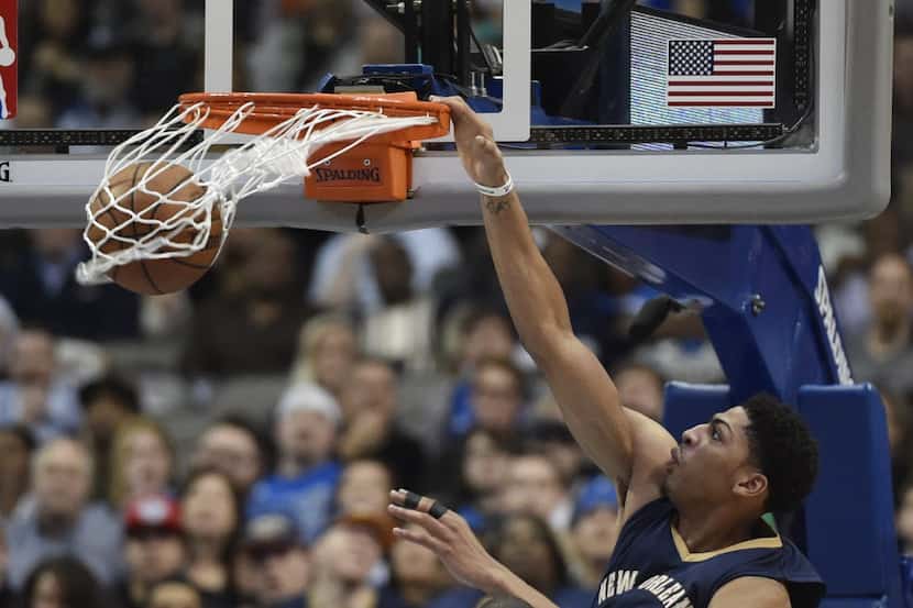 New Orleans Pelicans forward Anthony Davis (23) dunks on Dallas Mavericks center Tyson...