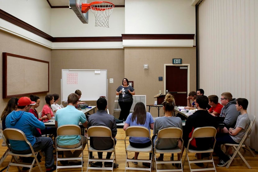 
Angela Belnap teaches an early-morning seminary class at the Church of Jesus Christ of...