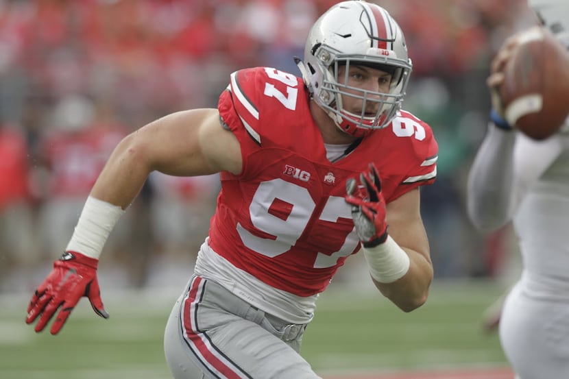 FILE - In this Sept. 19, 2015, file photo, Ohio State defensive lineman Joey Bosa plays...