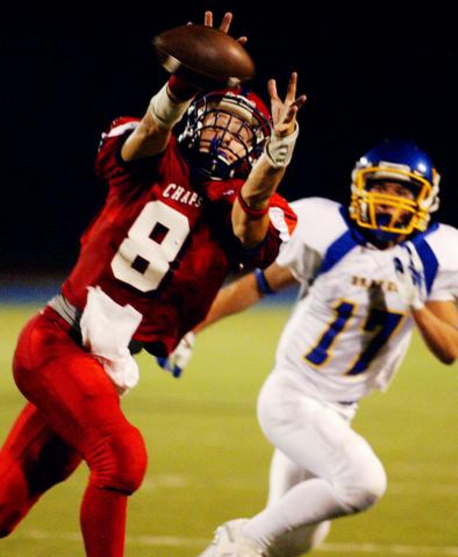 Aubrey Kaleb Parrent (8) catches a pass in front of Nevada Community senior defensive back...