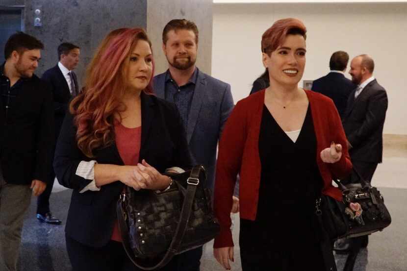Jamie Marchi (left) and Monica Rial walk into the Tom Vandergriff Civil Courts  Building in...