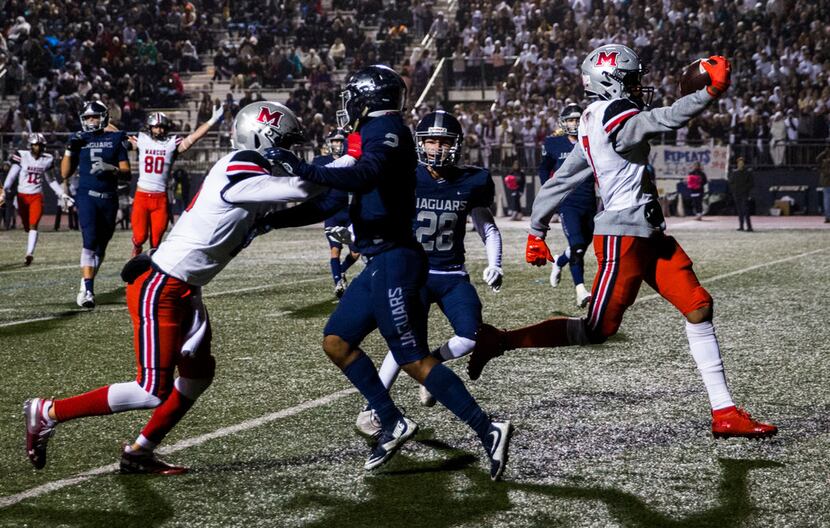 Flower Mound Marcus wide receiver J. Michael Sturdivant (7) runs to the end zone for a...