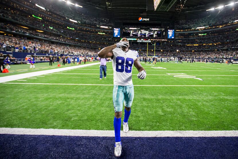 Dallas Cowboys wide receiver Dez Bryant blows kisses to the crowd after the Cowboys 29-23...