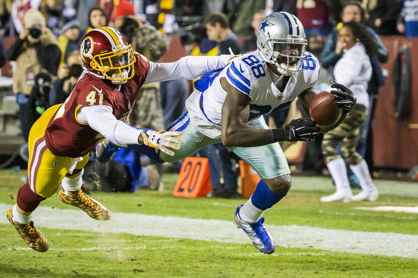 Dallas Cowboys wide receiver Dez Bryant (88) makes the catch on a 42-yard reception as...