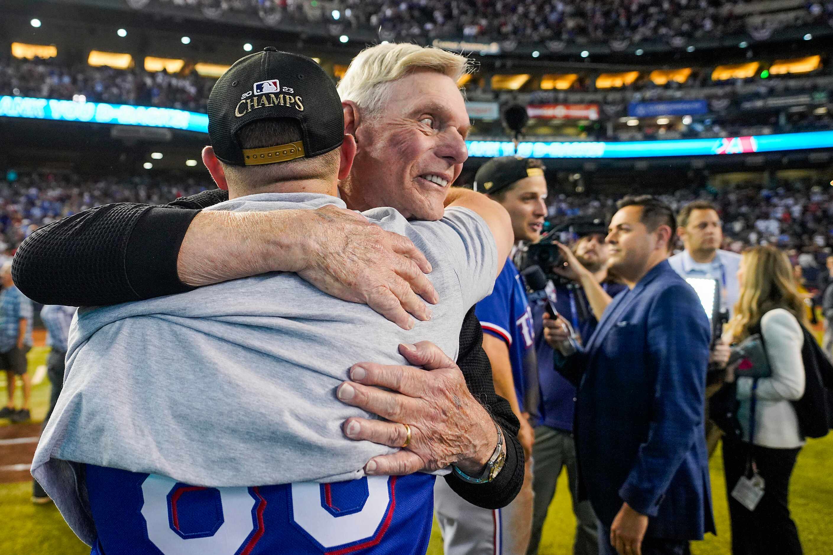 Texas Rangers owner Ray Davis celebrate winning players and coaches after a victory over the...