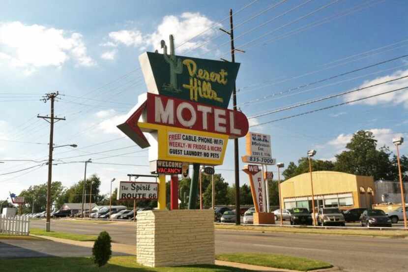 
The Desert Hills Motel on Route 66 exhibits the road’s nostalgic appeal with funky signs...
