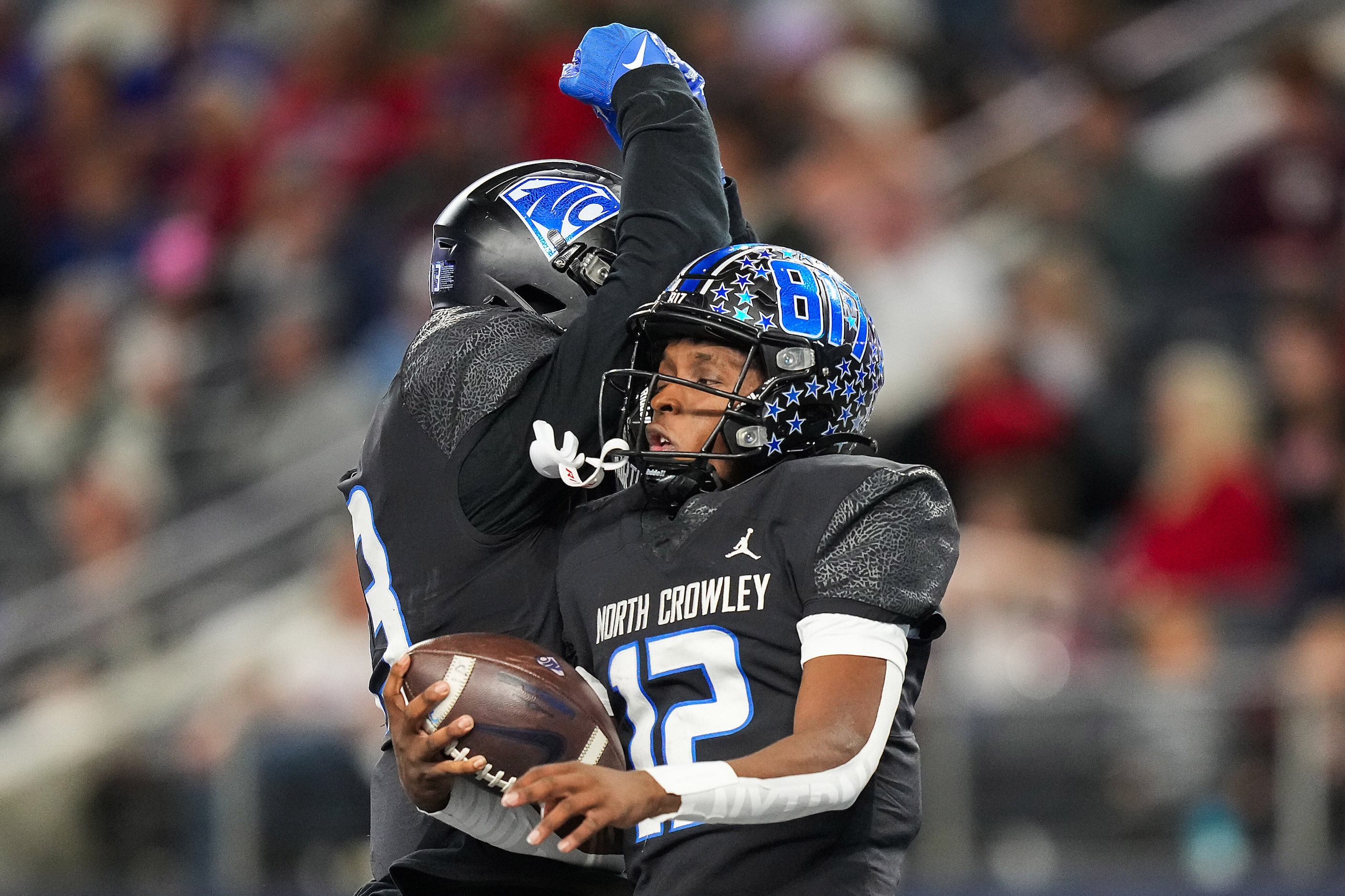 North Crowley quarterback Chris Jimerson (12) celebrates after scoring on a 44-yard...