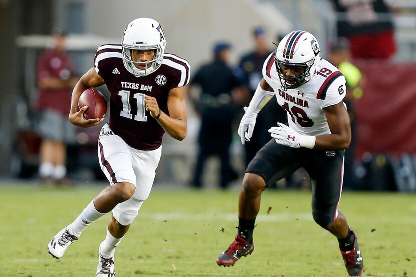 COLLEGE STATION, TX - SEPTEMBER 30:  Kellen Mond #11 of the Texas A&M Aggies runs with the...