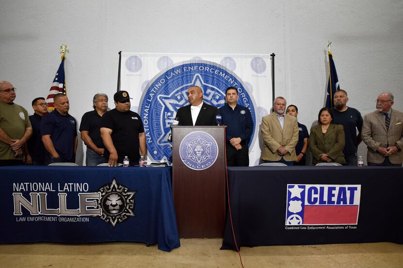 George Aranda, speaking, director of the National Latino Law Enforcement Organization, calls...