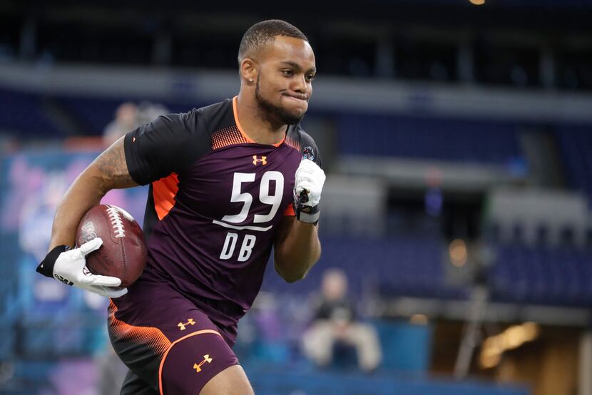 Virginia defensive back Juan Thornhill runs a drill at the NFL football scouting combine in...