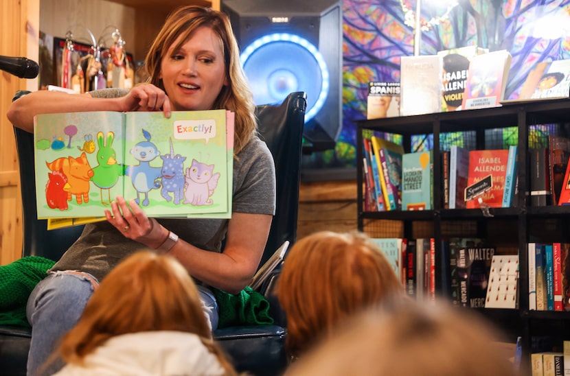 Amber Briggle reads “Neither" by Airlie Anderson to a group gathered for Transgender...