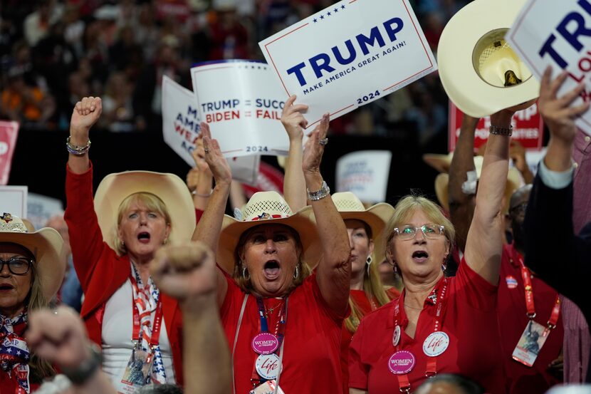 Texas delegates react during the Republican National Convention, Monday, July 15, 2024, in...