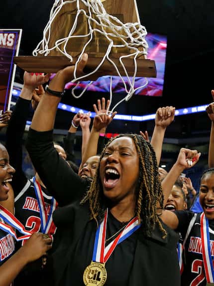 Duncanville head coach Lajeanna Howard holds the Trophy in a 6A final on  Saturday, March 7,...