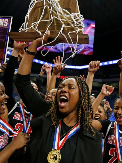 Duncanville head coach Lajeanna Howard holds the Trophy in a 6A final on  Saturday, March 7,...