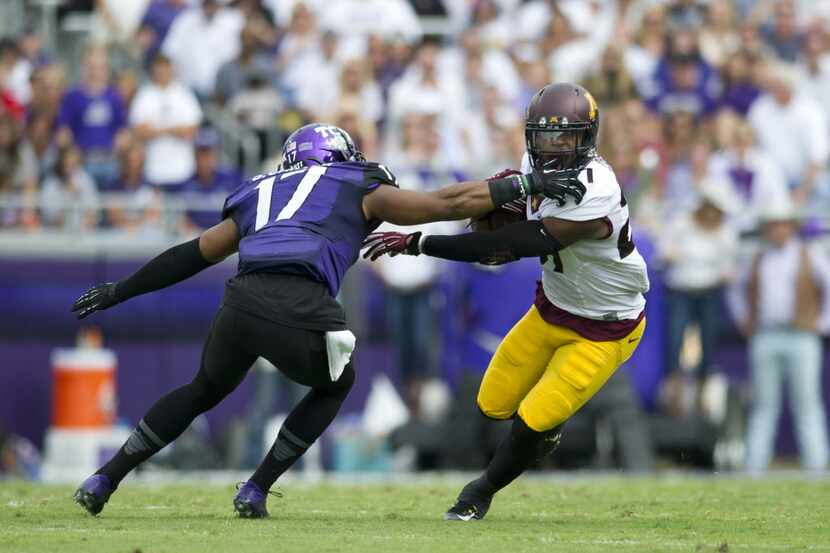 In an accurate representation of Minnesota's new game, "Go Gopher Go!", David Cobb #27 of...