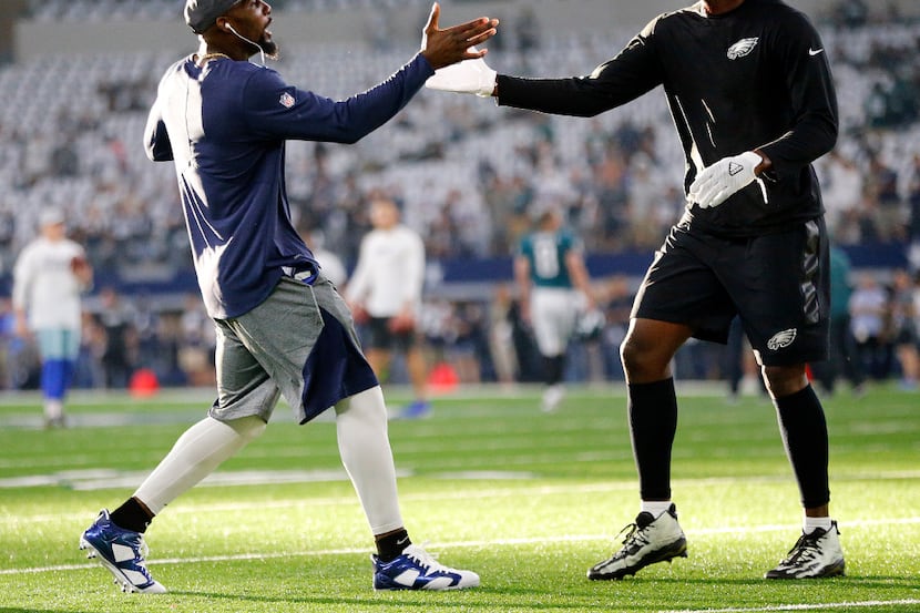 Dallas Cowboys wide receiver Dez Bryant (left) greets Philadelphia Eagles wide receiver...
