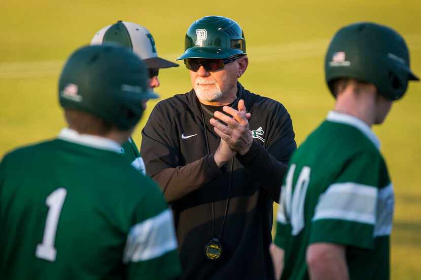 Prosper coach Rick Carpenter encourages his players before a District 14-5A baseball game...