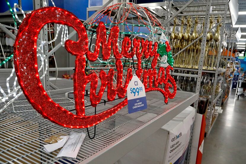 A large Christmas sign on display at the At Home store on Hwy. 121 in Plano.