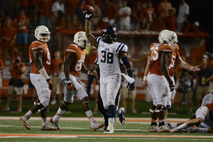 Sep 14, 2013; Austin, TX, USA; Mississippi Rebels linebacker Mike Marry (38) reacts after a...