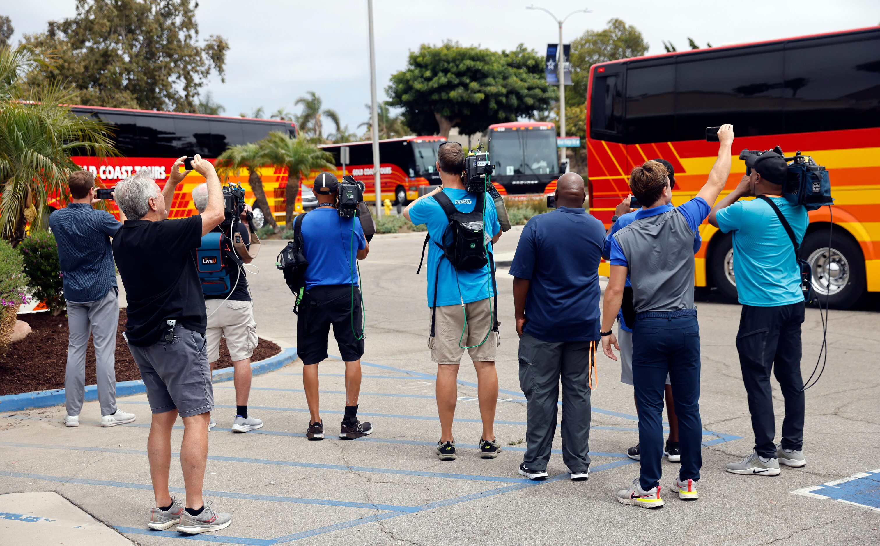 The Dallas media lines up to record the Dallas Cowboys players, coaches and staff arriving...