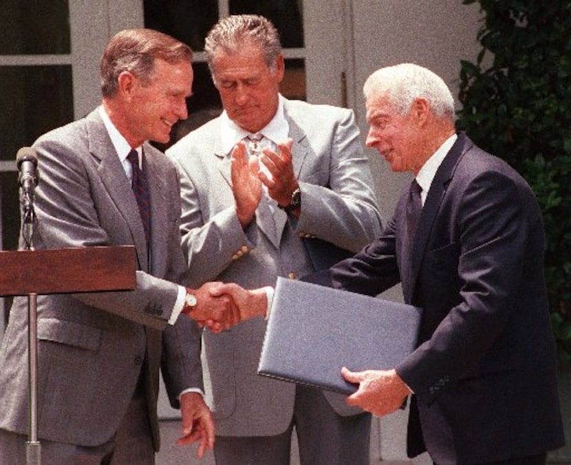 President George Bush presented Presidential Citations "for their contributions to baseball...