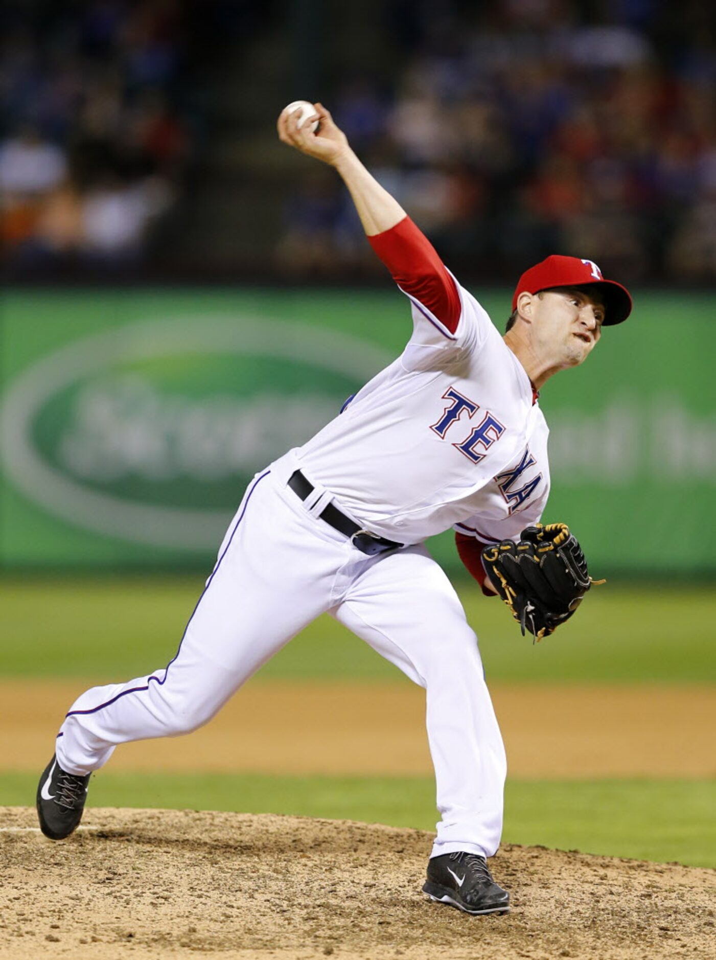 Texas Rangers relief pitcher Jason Frasor (44) throws in the twelfth inning against the...