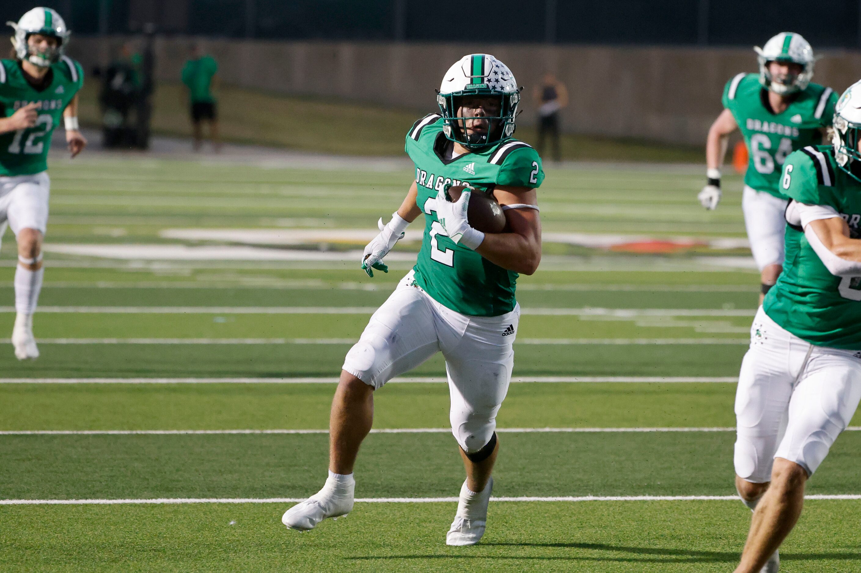 Southlake Carroll running back Owen Allen (2) runs for a touchdown against Arlington Martin...