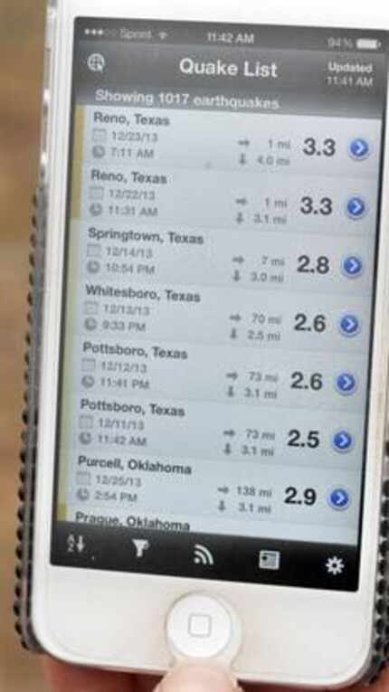 Reno resident Julie Hutcheson uses QuakeFeed app on her iPhone to verify the earthquakes...